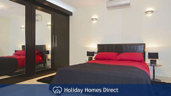 Villa insignia spare bedroom and tv in Lanzarote